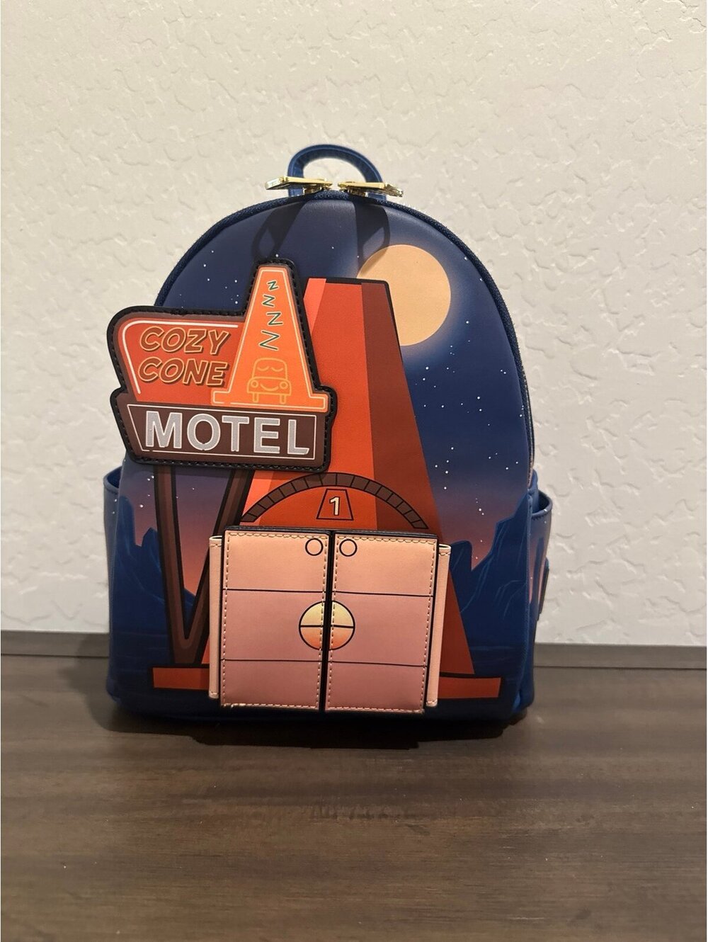 Loungefly Disney Pixar Cars Cozy Cone Motel Glow-in-the-Dark Mini Backpack NWT